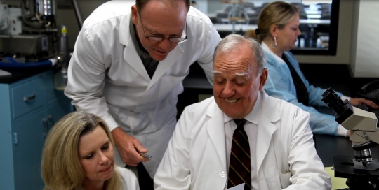 The Team at Work: Cynthia, Frank, and Dr. Jacobs